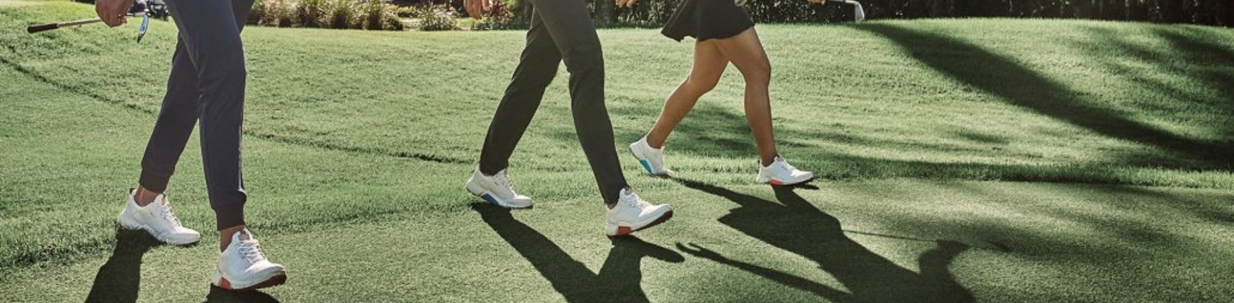Golfers wearing ECCO golf shoes on the course