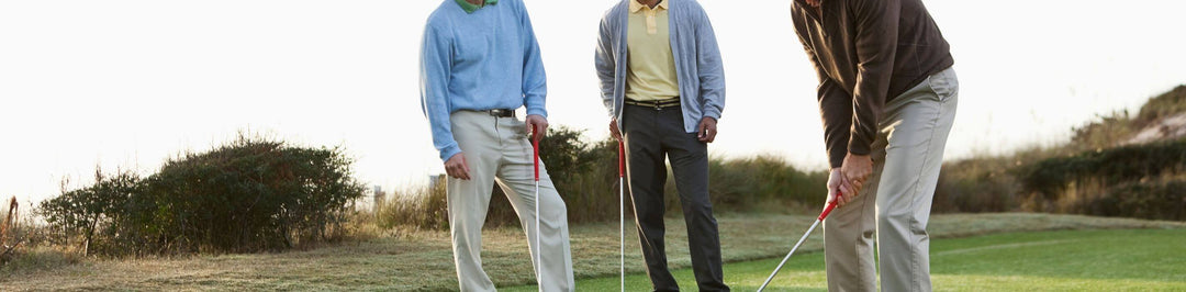 3 golfers playing golf