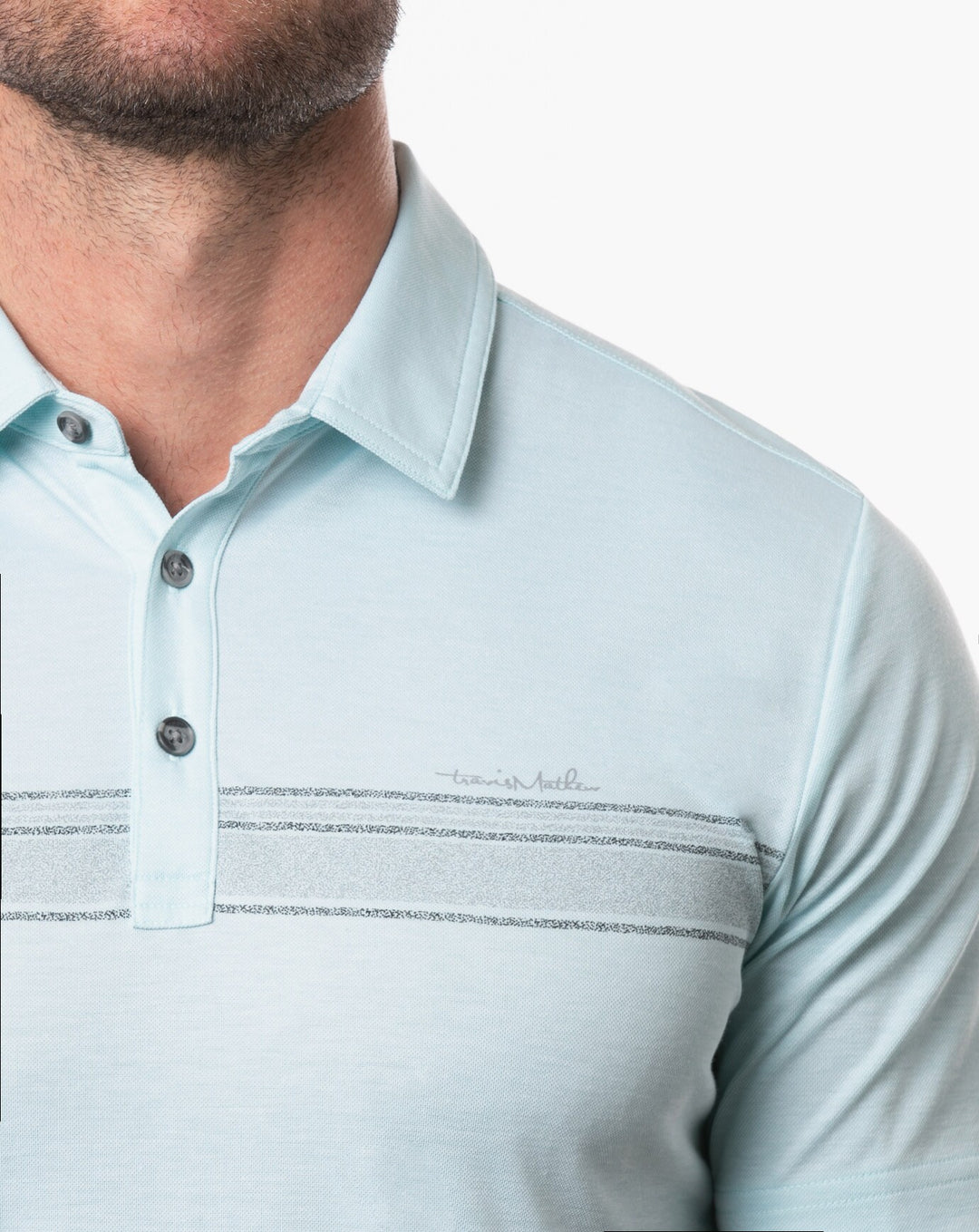 TRAVIS MATHEW MENS HOLE CARD POLO - HEATHER PETIT FOUR