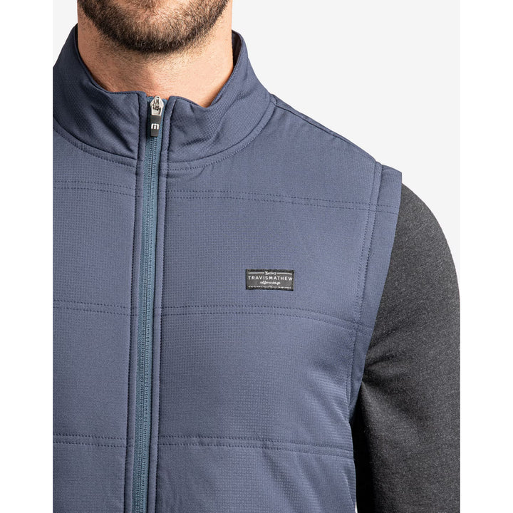 TRAVIS MATHEW MENS INTERLUDE PUFFER VEST - MOOD INDIGO