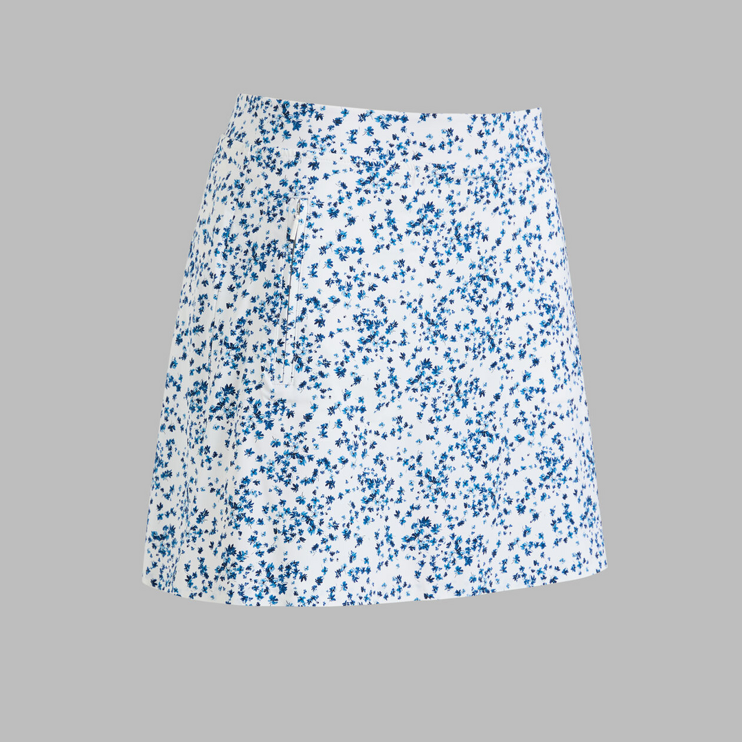 G/FORE WOMEN'S SCATTERED DITZY FLORAL SILKY TECH NLYON SKORT - TWILIGHT