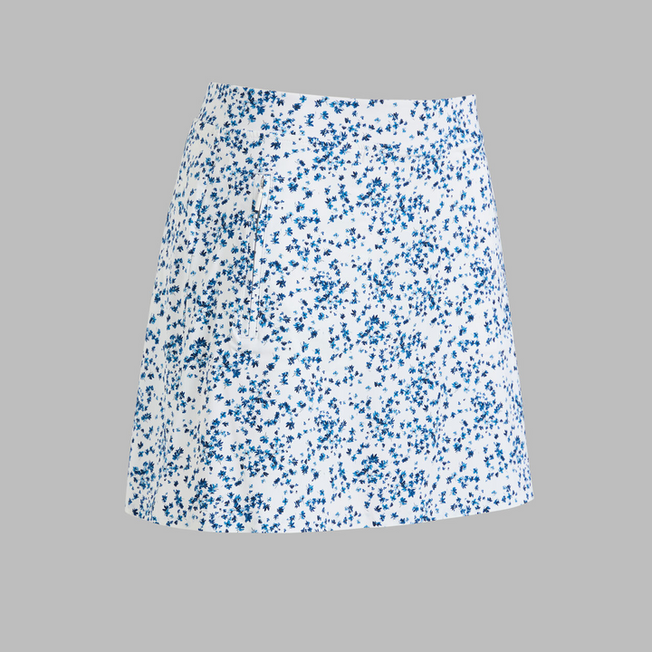G/FORE WOMEN'S SCATTERED DITZY FLORAL SILKY TECH NLYON SKORT - TWILIGHT