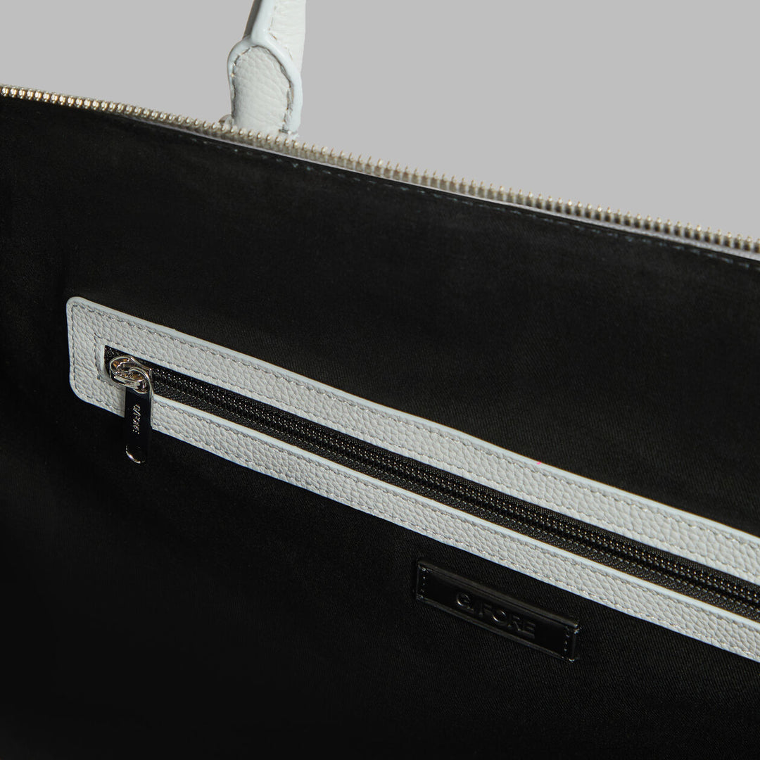 G/FORE EMBOSSED SKULL & TEES LEATHER WEEKENDER - NIMBUS