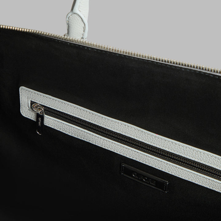 G/FORE EMBOSSED SKULL & TEES LEATHER WEEKENDER - NIMBUS